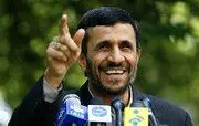  احمدی‌نژاد کار با دوربین عکاسی را یاد می گیرد+ عکس