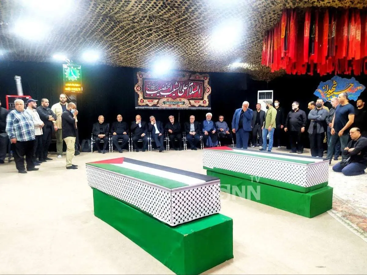اولین تصویر تابوت‌های شهید هنیه و محافظش؛ وداع احساسی در معراج شهدای تهران