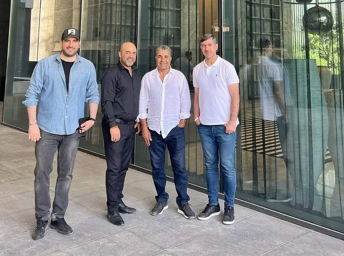 امید حاجیلی در کنار کریم باقری/عکس