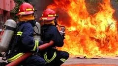 آتش‌سوزی یک ساختمان چهار طبقه مسکونی در خیابان ولیعصر/ آمار مصدومان