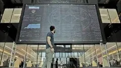 کاهش اندک بورس / شاخص بورس در کانال ۳.۲ میلیون واحد باقی ماند