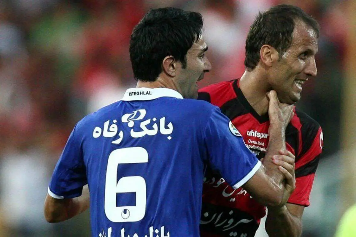 نکونام در این دربی لباس بازیکن پرسپولیس را پاره کرد!/ عکس جالب